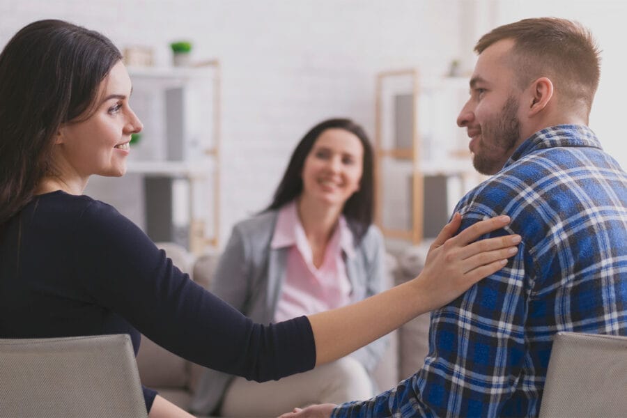 Couple meeting with marriage counselor in Wichita, KS
