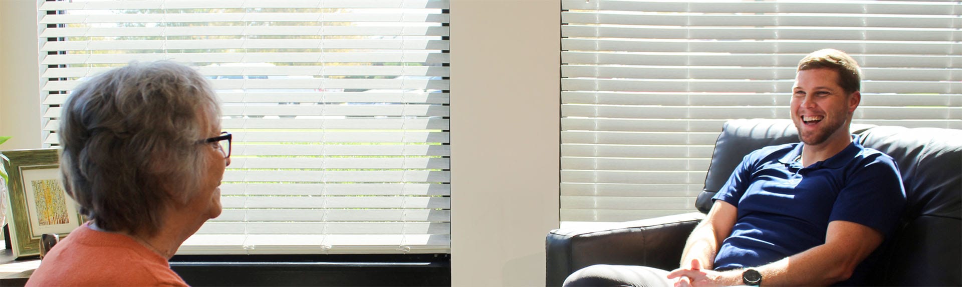 Axiom therapist talking with client