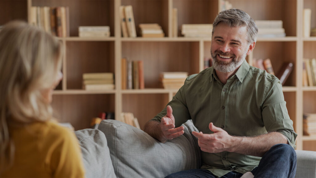man meeting with therapist to manage anxiety