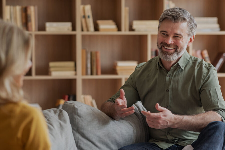man meeting with therapist to manage anxiety